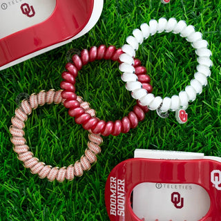 Boomer Sooner OU large spiral hair ties by Teleties on wrist - House of Me boutique Norman OK