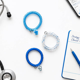 On Call small spiral hair ties by Teleties on wrist - House of Me boutique Norman OK
