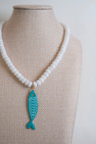 White Beaded Fish Pendant Necklace side angle view - House of Me boutique Norman OK
