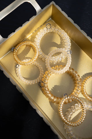 Luxury Living small spiral hair ties by Teleties on wrist - House of Me boutique Norman OK