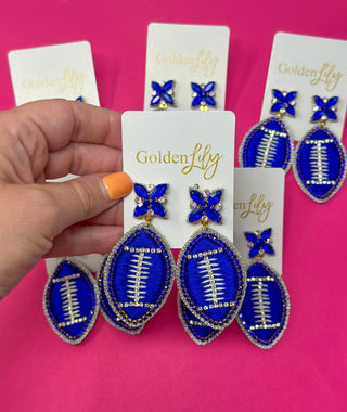 Blue football thread dangle earrings by Golden Lily, game day jewelry - House of Me boutique Norman OK