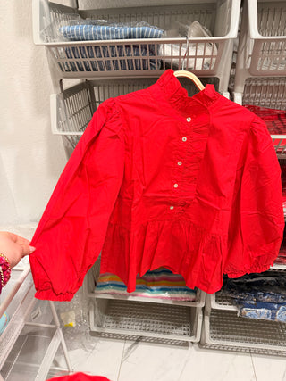 Lady in Red Ruffle Top.