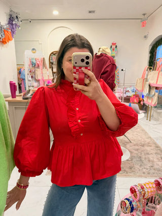 Lady in Red ruffle top styled on model - House of Me boutique Norman OK