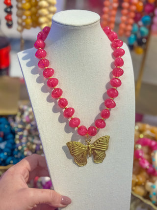 Pink beaded charm necklace with butterfly by Golden Lily - House of Me boutique Norman OK