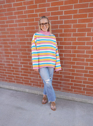 Women's Rainbow Hibiscus sweater with bright colorful stripes - House of Me boutique Norman OK