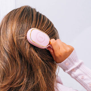 Bubblegum pink mini detangler hair brush by Teleties close up view - House of Me boutique Norman OK